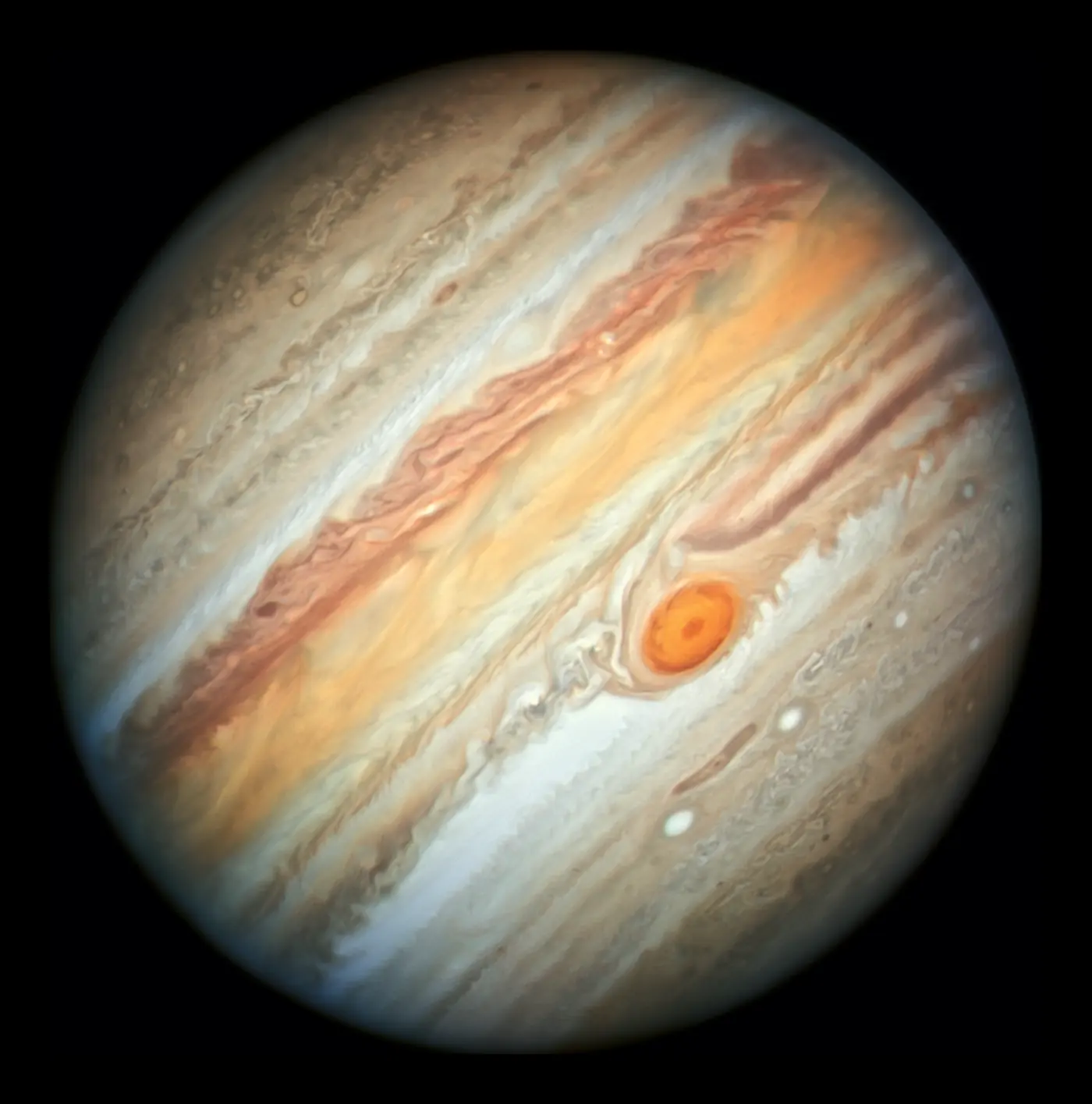 Jupiter with its cream and rust bands and the Great Red Spot