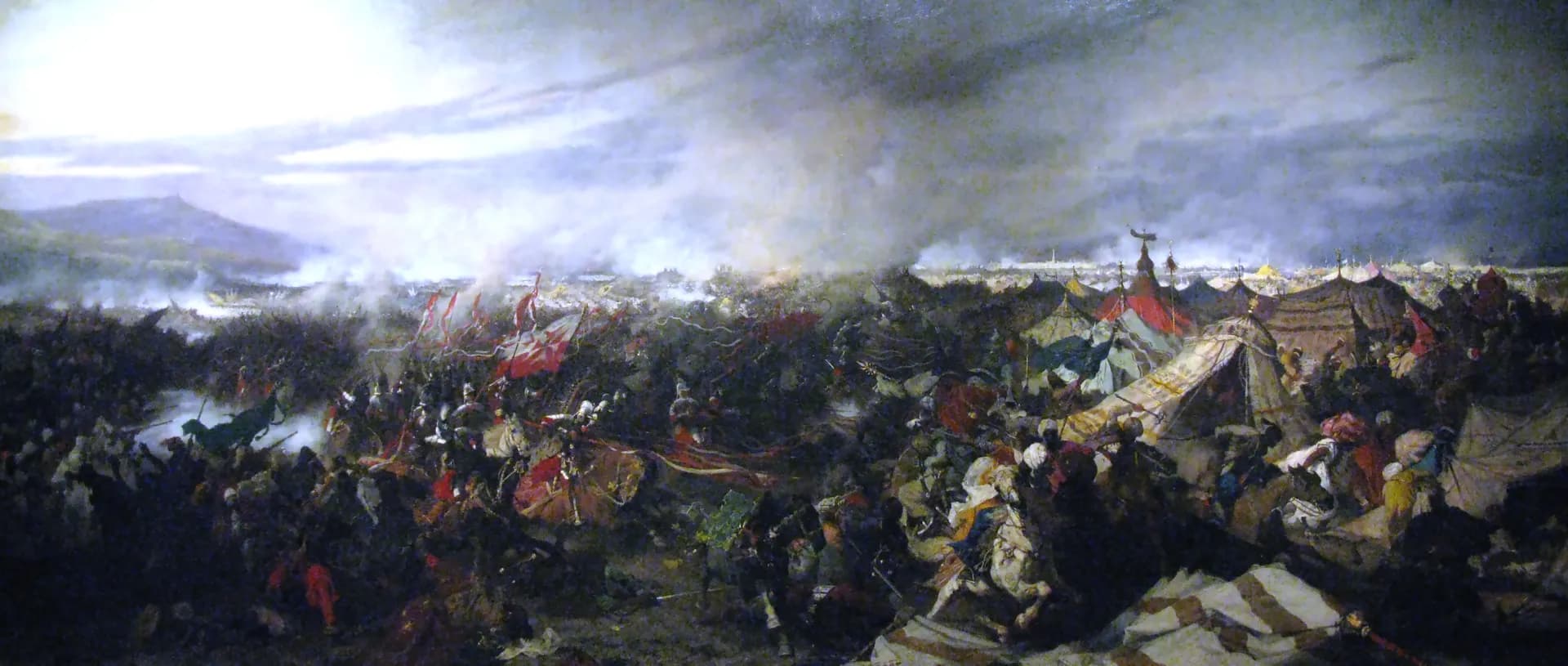 Józef Brandt's panoramic painting of the Battle of Vienna: cavalry clashing in smoke under a wide sky